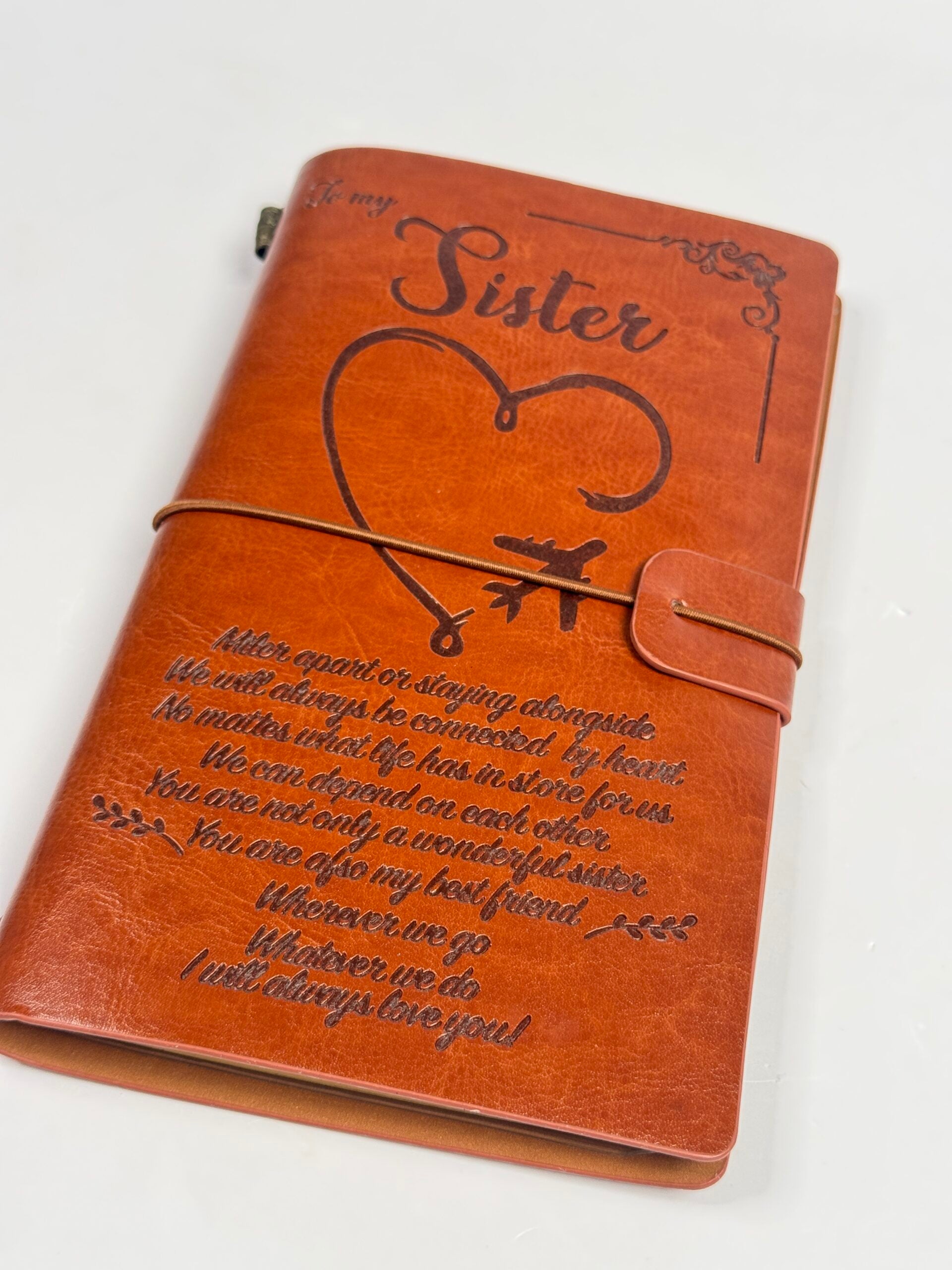 Journal notebook with storage pouch