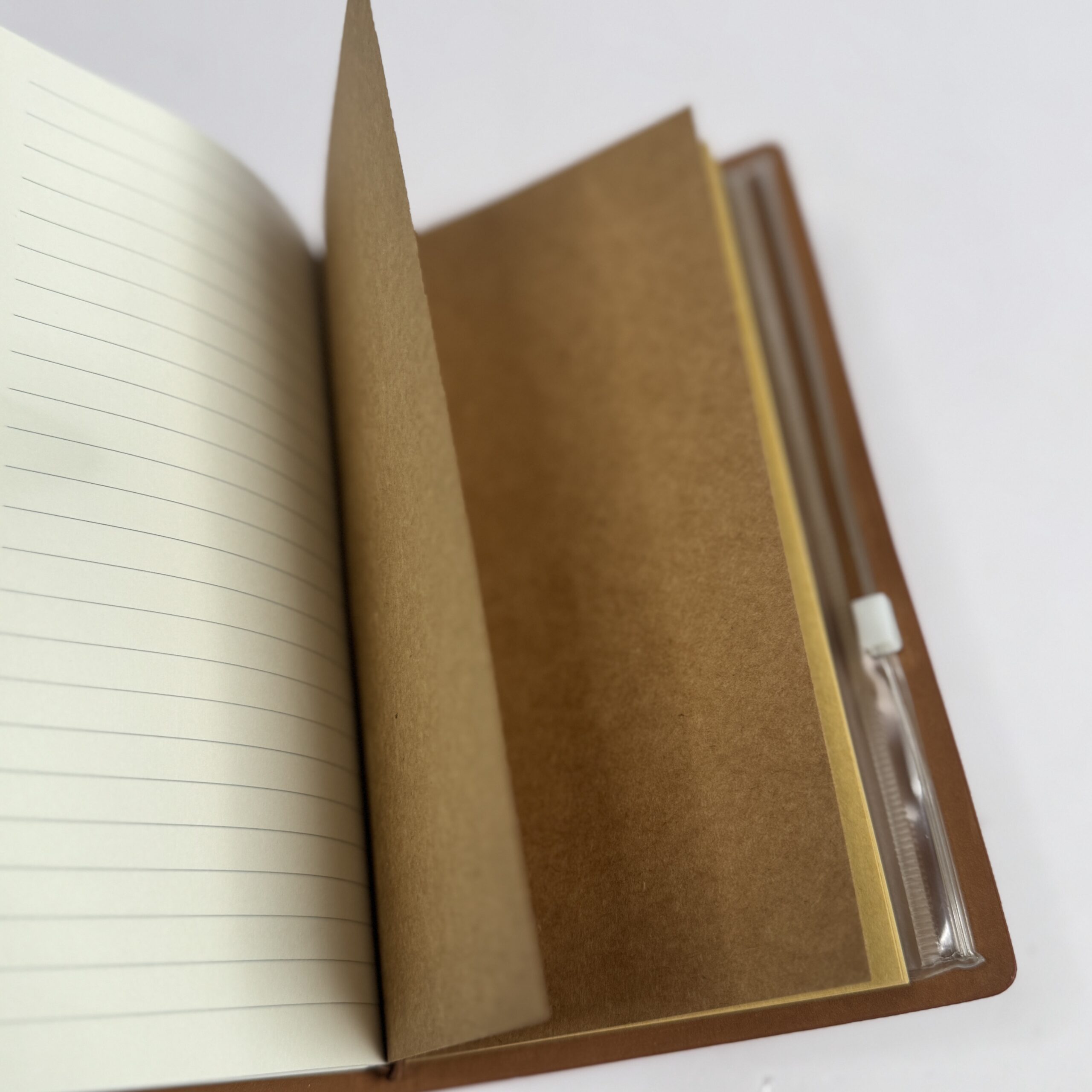Journal notebook with storage pouch