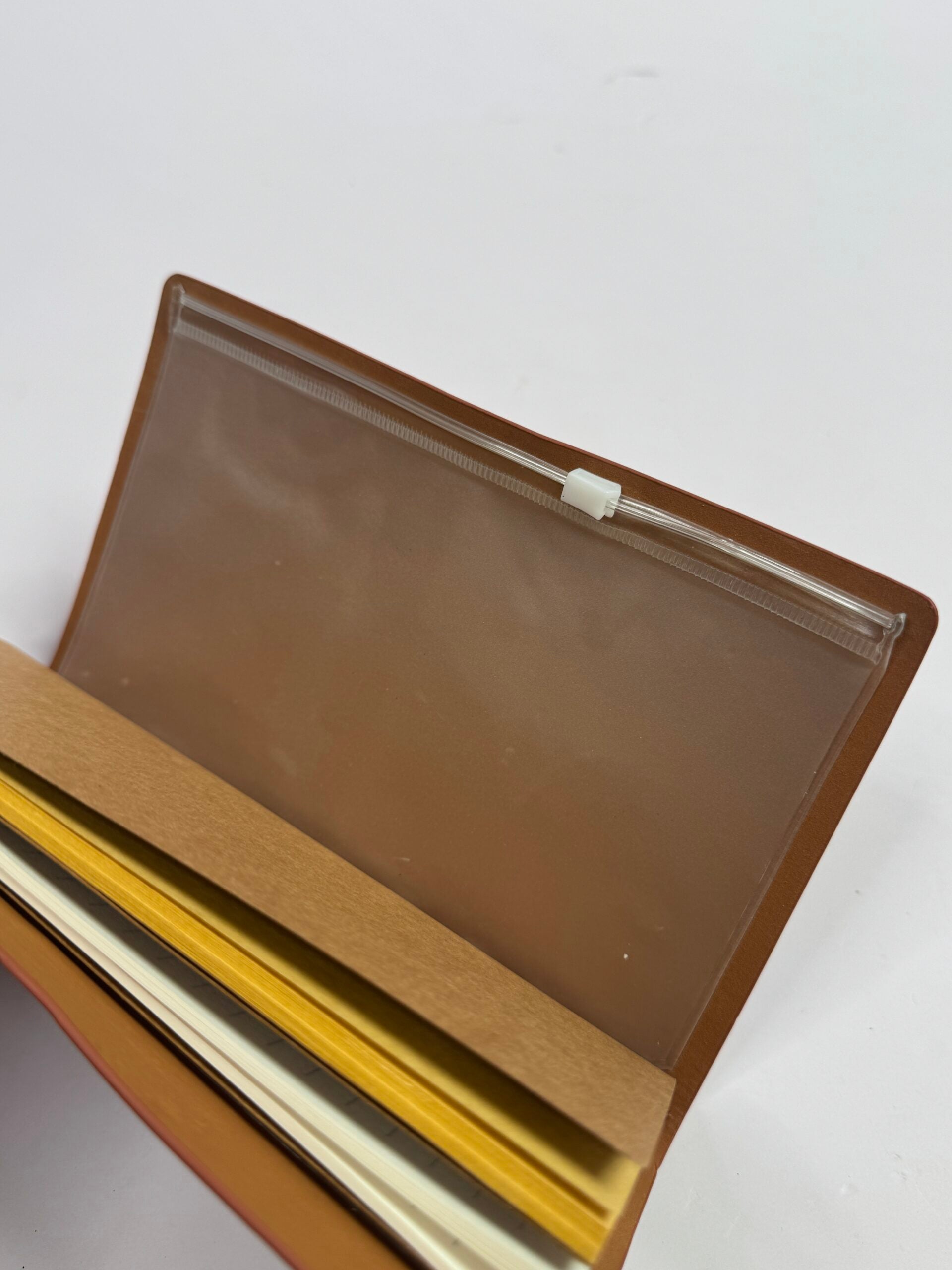 Journal notebook with storage pouch