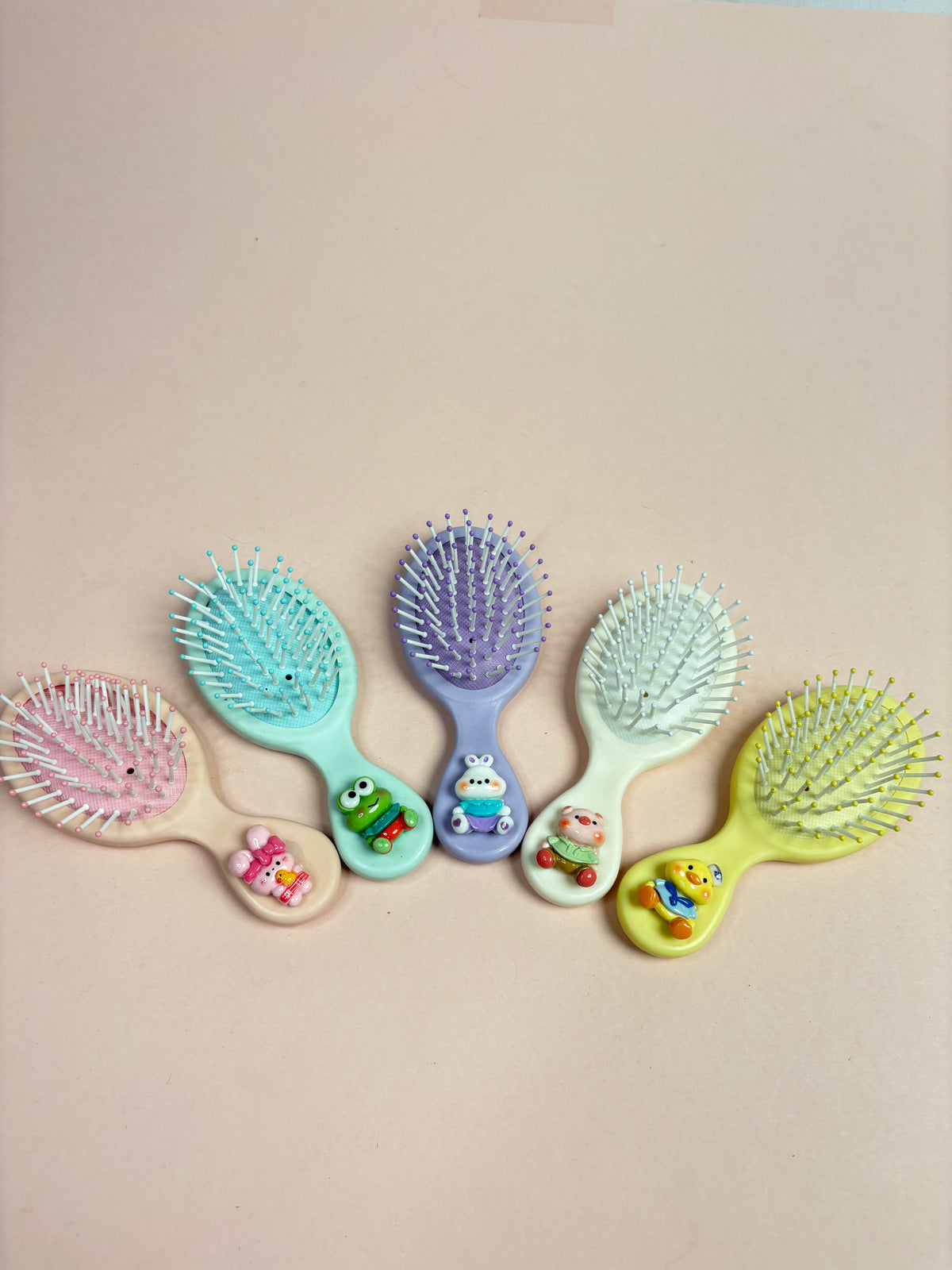 Mini paddle brush