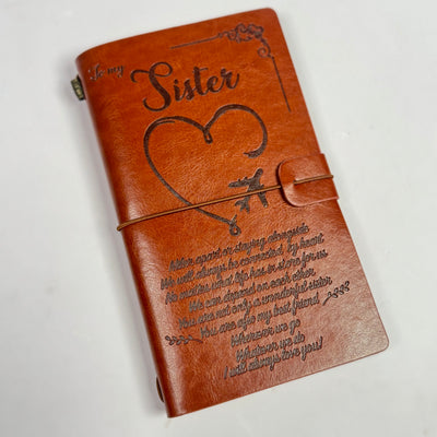 Journal notebook with storage pouch
