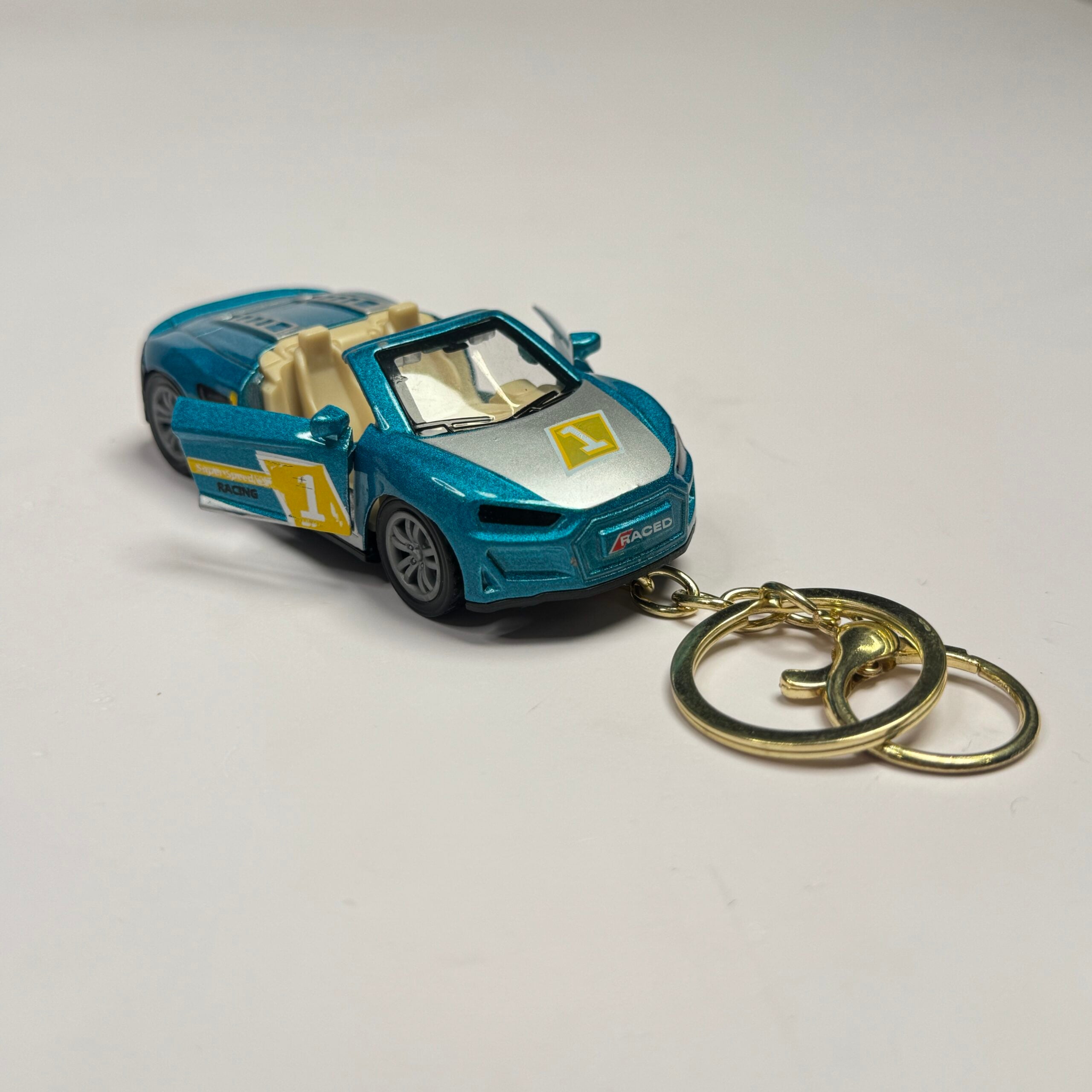 Die cast Car Keychain with Doors opening