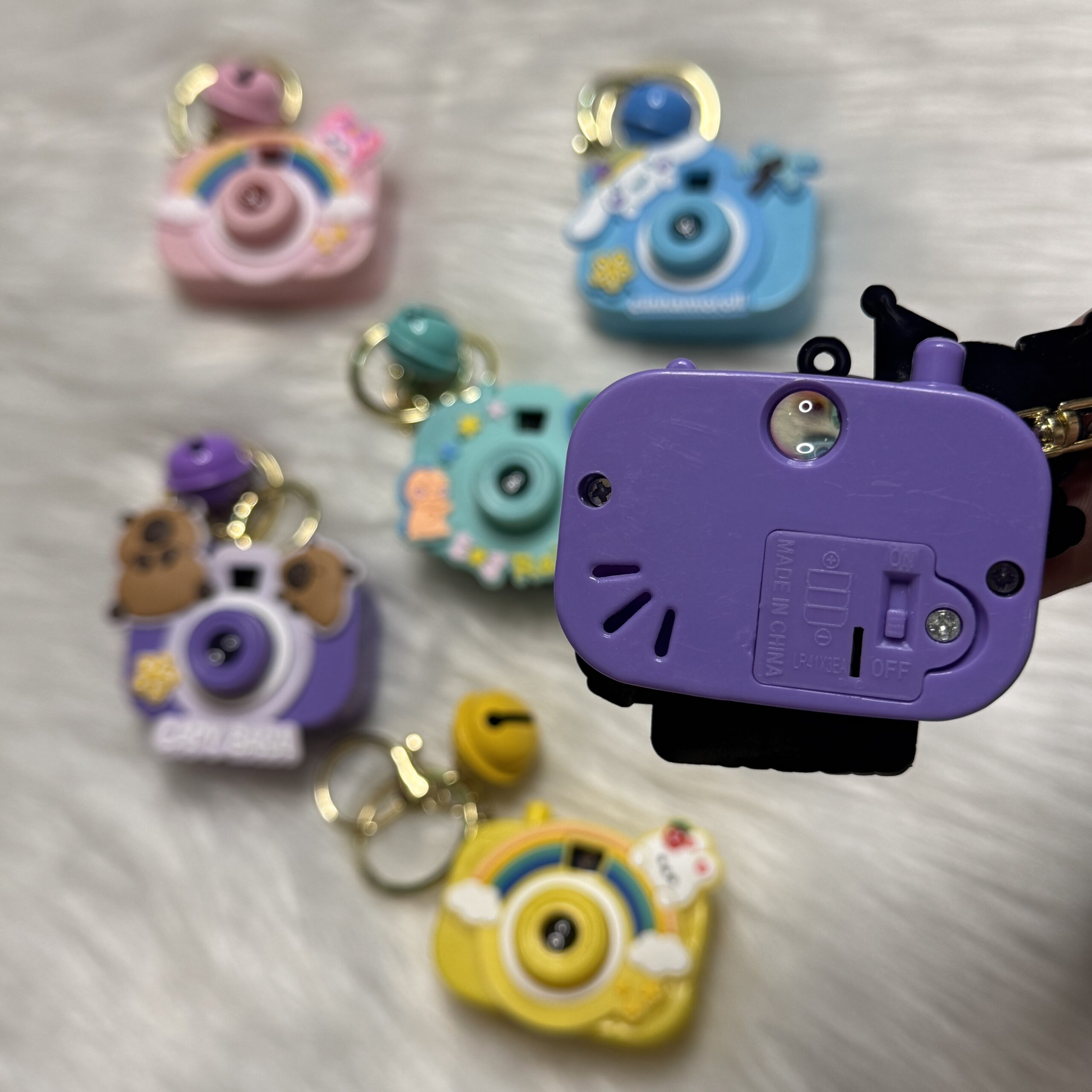 Camera projector keychain with lights- Random
