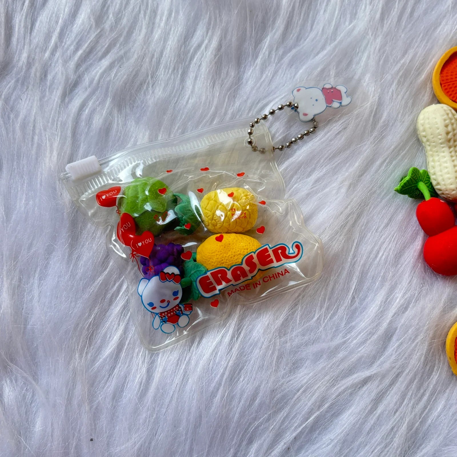 Set of 4 vegetable erasers in a pouch