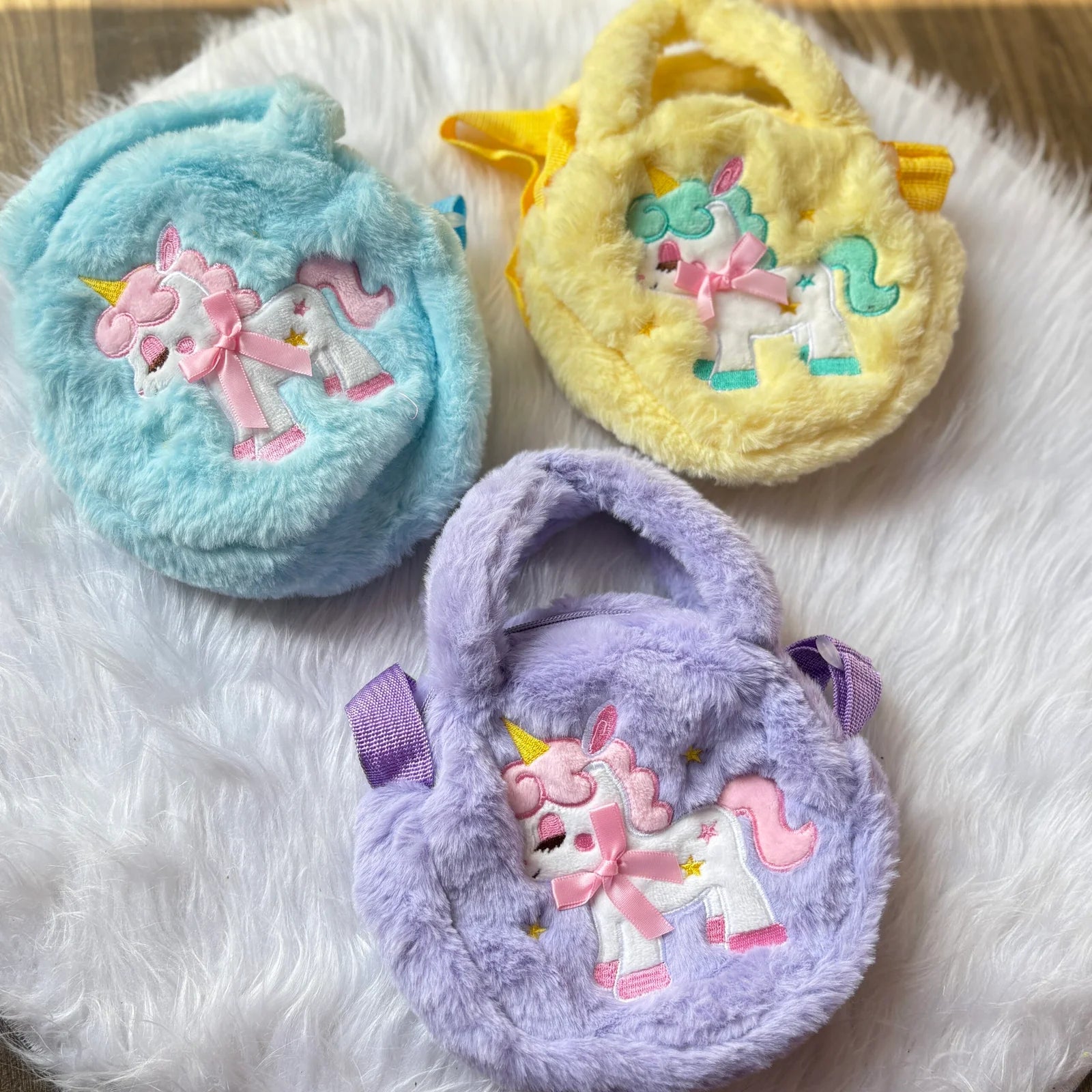 Premium unicorn fur sling bad with handle