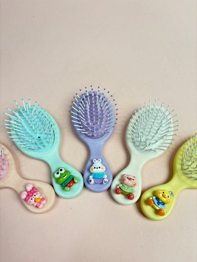 Mini paddle brush