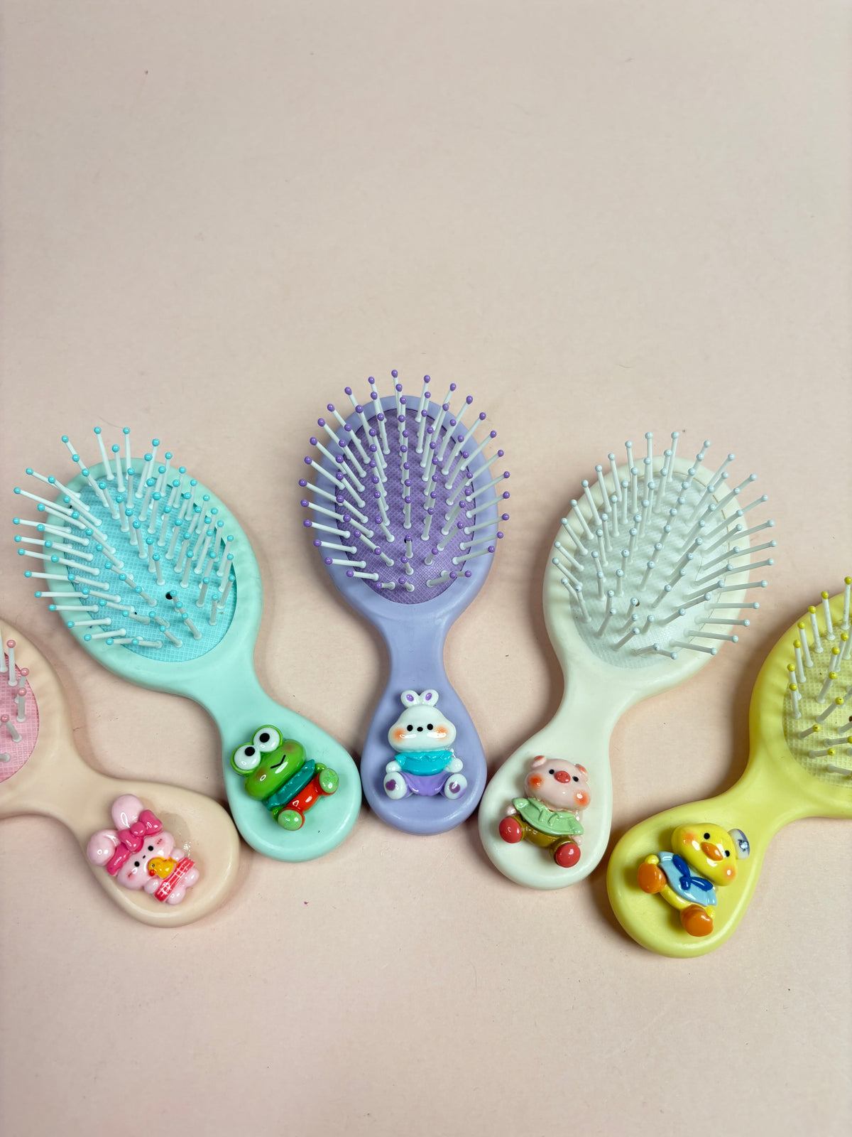 Mini paddle brush