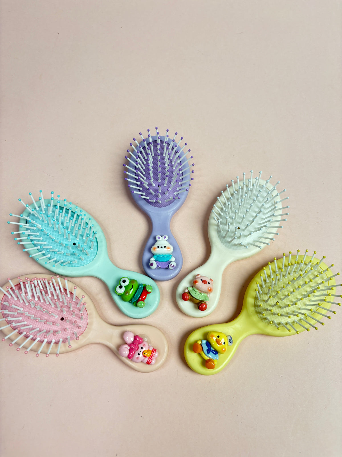 Mini paddle brush