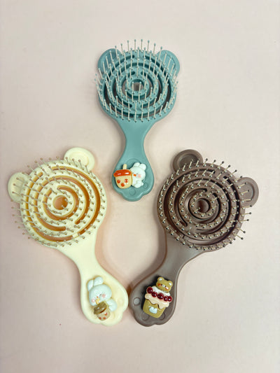 Mini paddle brush