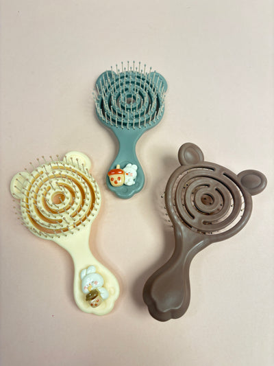 Mini paddle brush
