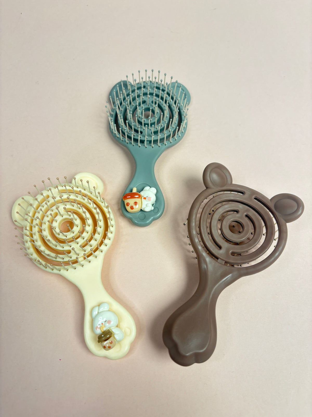 Mini paddle brush
