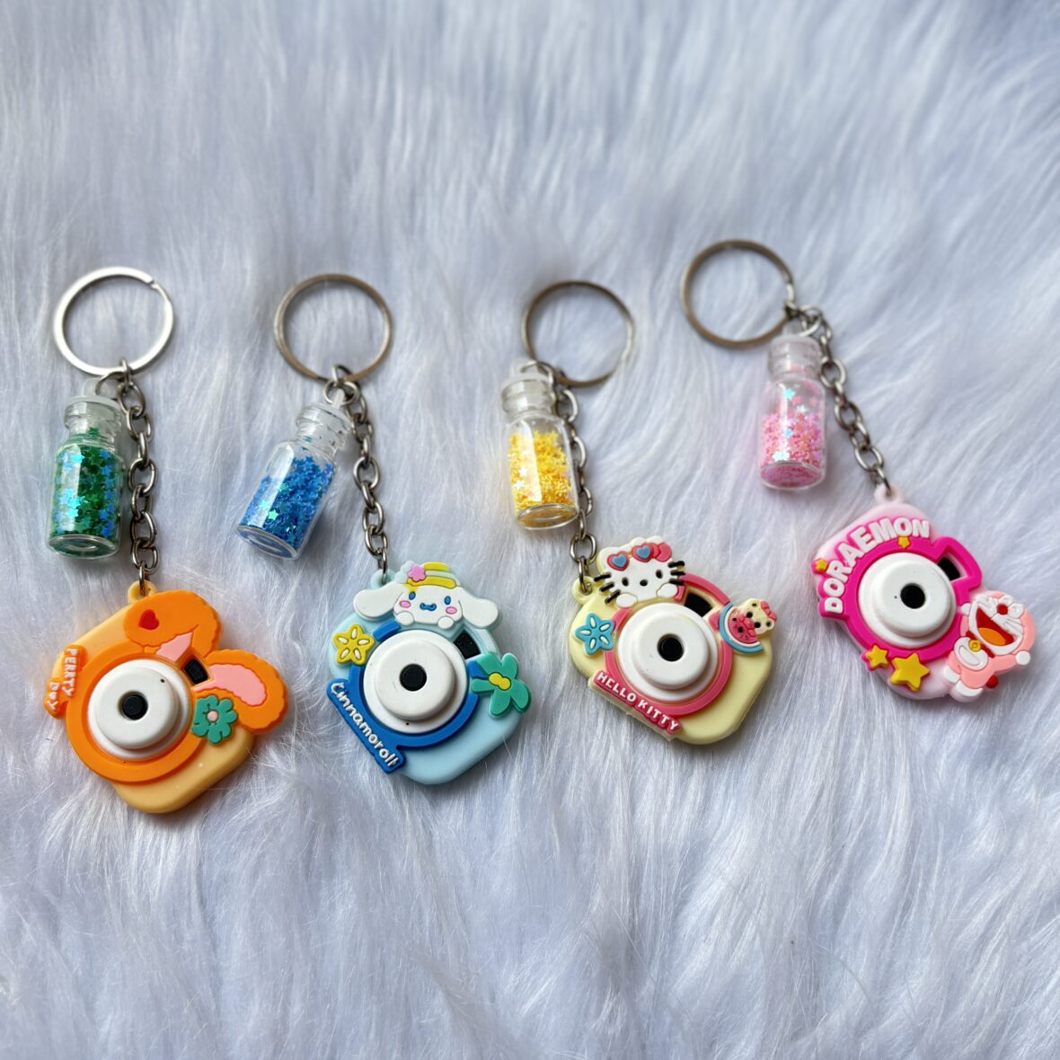 Camera theme keychain with bottle charm