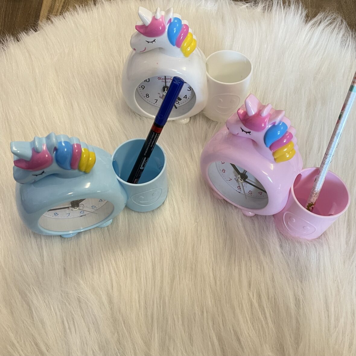 Unicorn alarm clock and pen stand